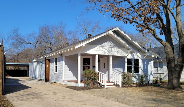 view of front of property featuring covered porch