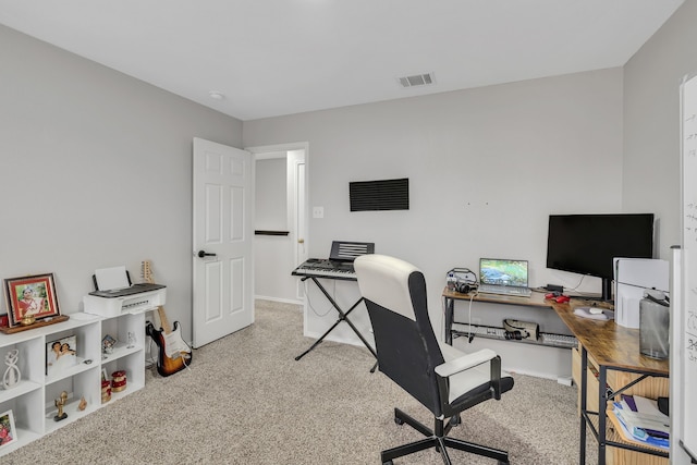 office area with light colored carpet