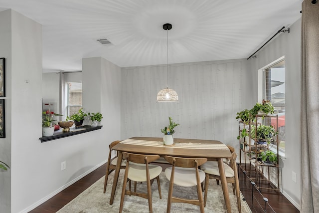 dining room featuring dark hardwood / wood-style floors