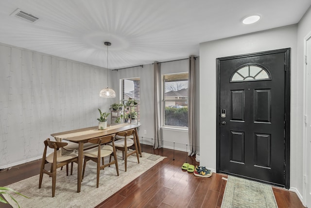 foyer with dark hardwood / wood-style flooring