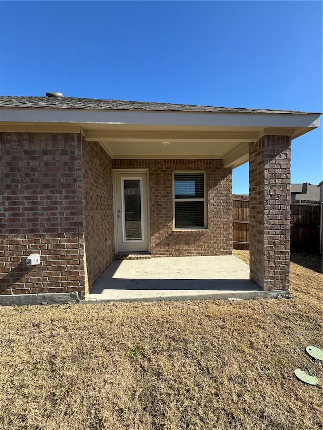 doorway to property featuring a patio area