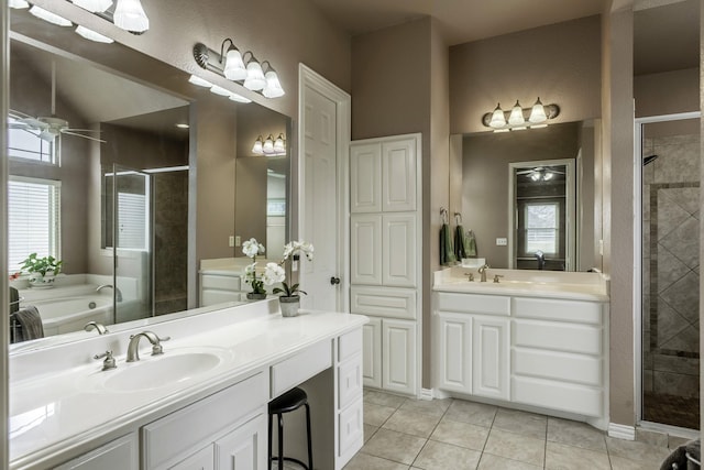 bathroom with a healthy amount of sunlight, ceiling fan, tile patterned floors, and independent shower and bath