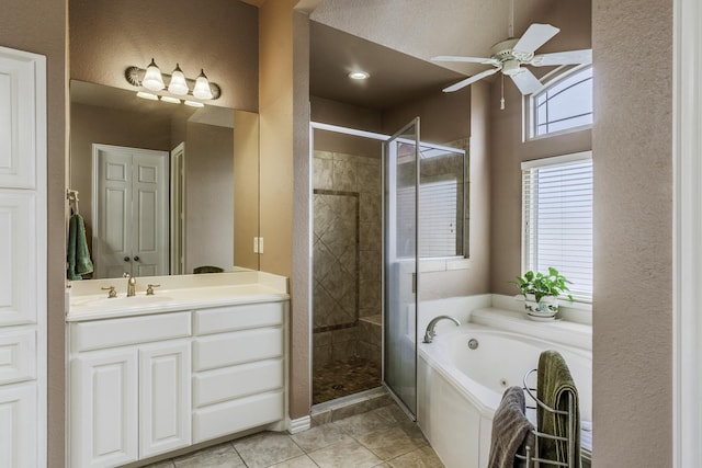 bathroom with tile patterned flooring, vanity, independent shower and bath, and ceiling fan