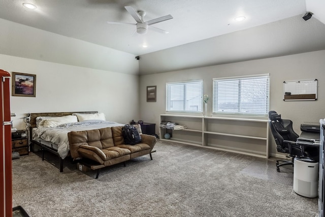 bedroom featuring vaulted ceiling, ceiling fan, and carpet