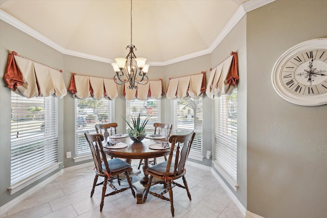 tiled dining space featuring ornamental molding and a chandelier