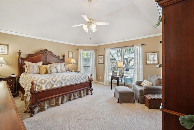 carpeted bedroom with crown molding and ceiling fan