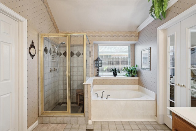 bathroom with tile patterned flooring, plus walk in shower, and vanity