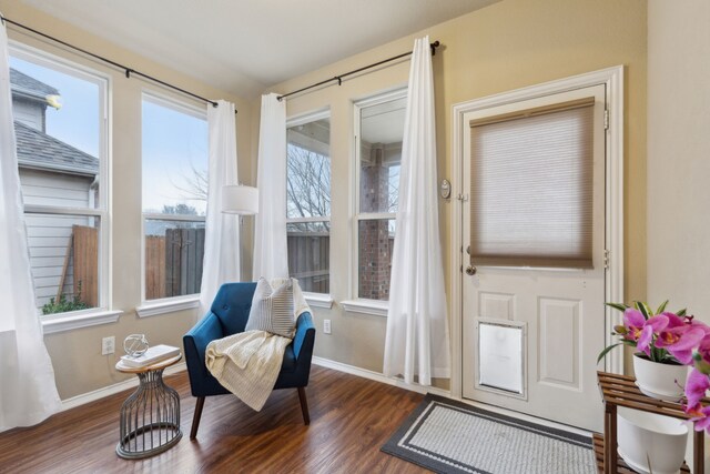 dining area featuring ornamental molding, dark wood-type flooring, and ceiling fan