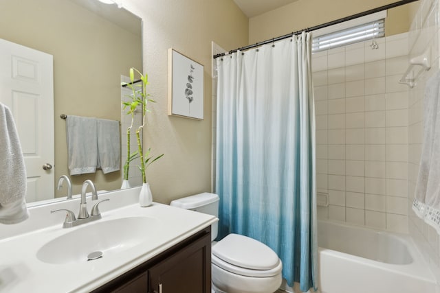 full bathroom with vanity, toilet, and shower / bath combo