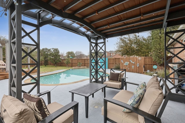 view of swimming pool featuring a patio and an outdoor hangout area