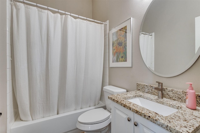 full bathroom featuring vanity, toilet, and shower / bath combo with shower curtain