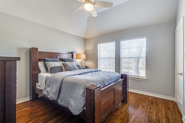 bedroom with lofted ceiling, dark wood-type flooring, and ceiling fan