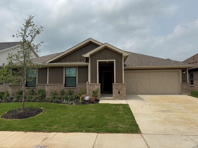 1744 River Bend Rd, Burleson, TX 76028 - view of front facade with a garage, driveway, board and batten siding, a front lawn, and brick siding
