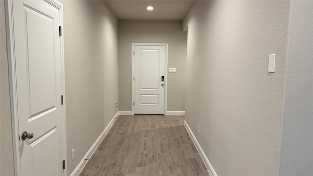 1744 River Bend Rd, Burleson, TX 76028 - hall with baseboards, light wood finished floors, and recessed lighting