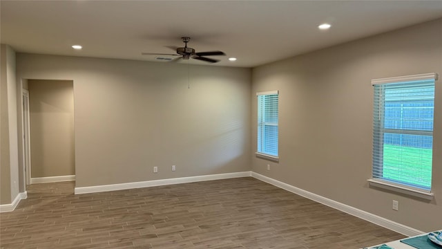 1744 River Bend Rd, Burleson, TX 76028 - unfurnished room with ceiling fan, wood finished floors, baseboards, and recessed lighting
