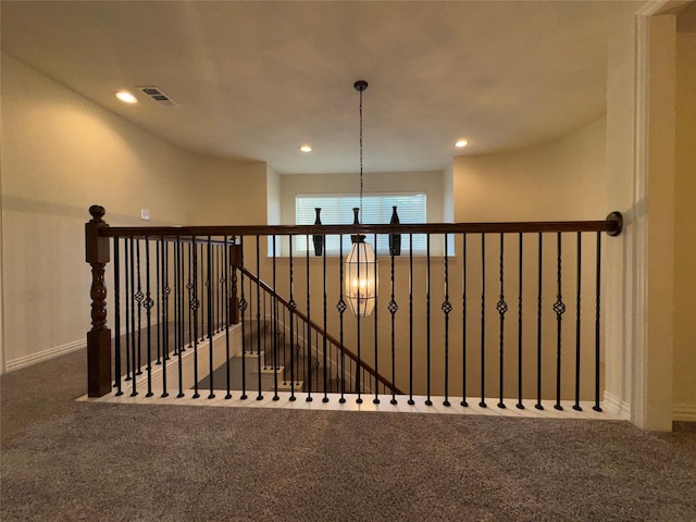 corridor featuring carpet flooring