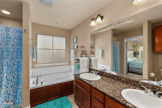 bathroom with vanity and a bathing tub