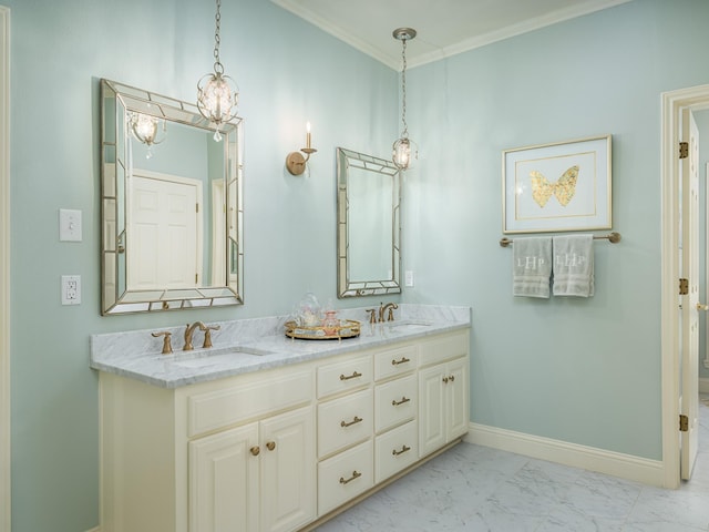 bathroom with ornamental molding and vanity