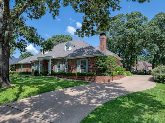 view of front of home with a front yard