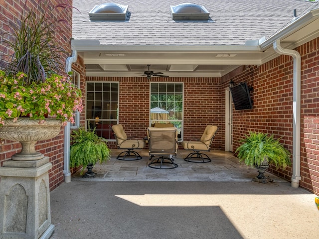 view of patio / terrace featuring ceiling fan