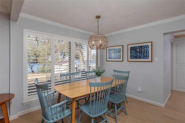 400 Driftwood Ct, Azle, TX 76020 - dining area featuring healthy amount of natural light, wood finished floors, crown molding, and a chandelier