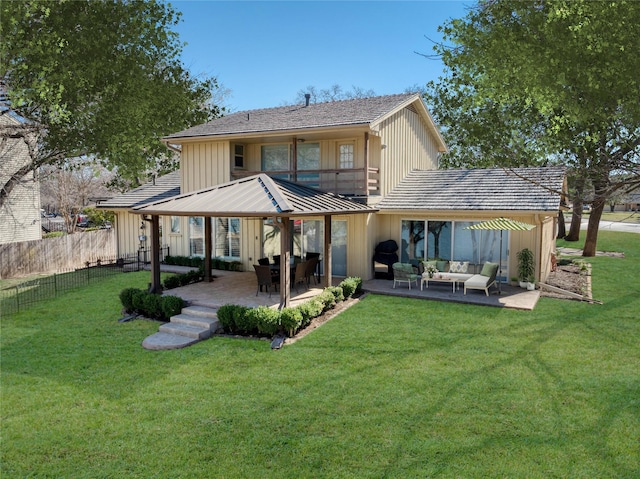 400 Driftwood Ct, Azle, TX 76020 - rear view of property featuring an outdoor hangout area, a patio area, board and batten siding, and a balcony