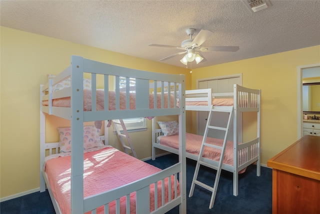 400 Driftwood Ct, Azle, TX 76020 - carpeted bedroom with a textured ceiling and a ceiling fan