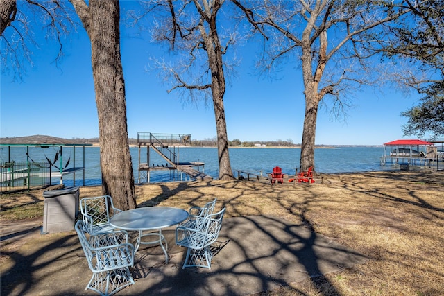 property view of water with fence