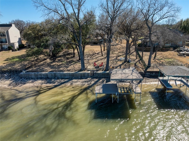 400 Driftwood Ct, Azle, TX 76020 - view of patio / terrace with boat lift and a dock