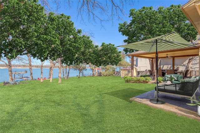 400 Driftwood Ct, Azle, TX 76020 - view of yard with a water view, a shed, a patio area, and an outdoor living space