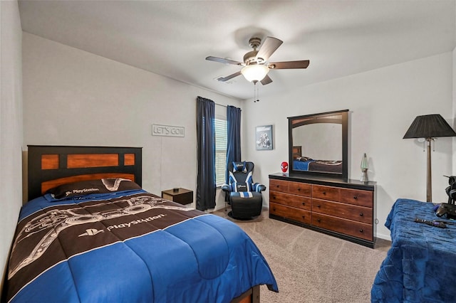 bedroom featuring ceiling fan and carpet flooring