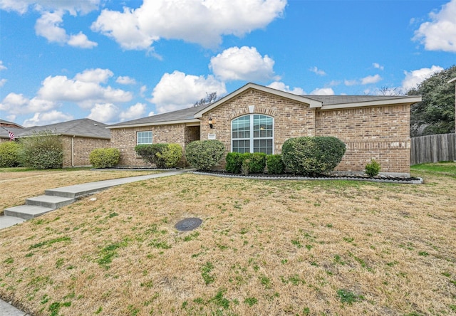 ranch-style house with a front yard