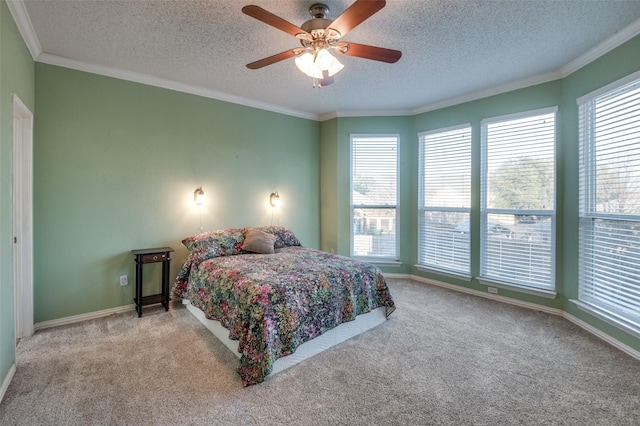 bedroom featuring a ceiling fan, light carpet, crown molding, and a textured ceiling