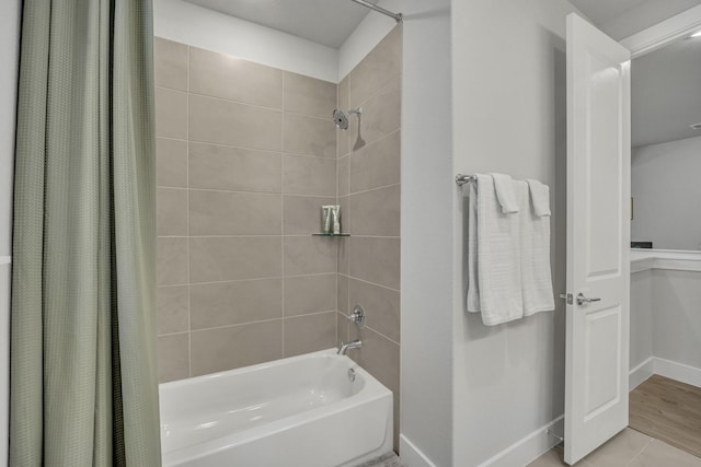 bathroom with shower / tub combo with curtain