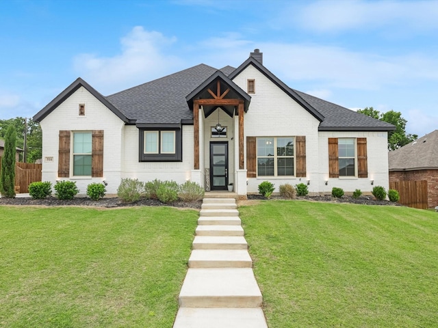 view of front of home with a front yard