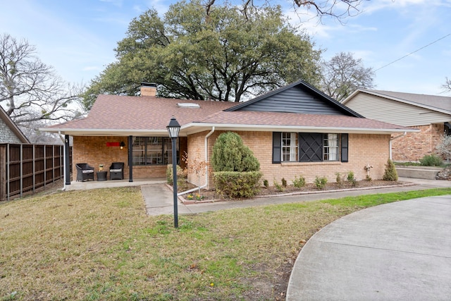 view of front of house with a front yard