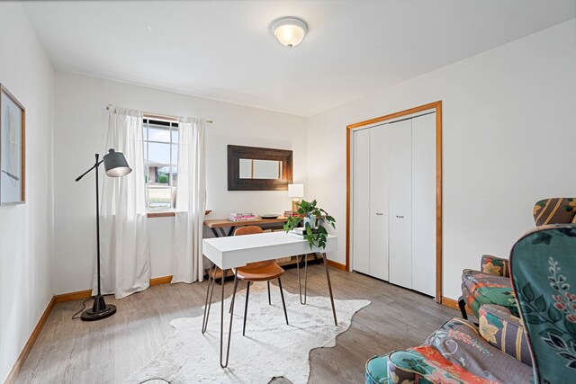 office area with light wood-type flooring