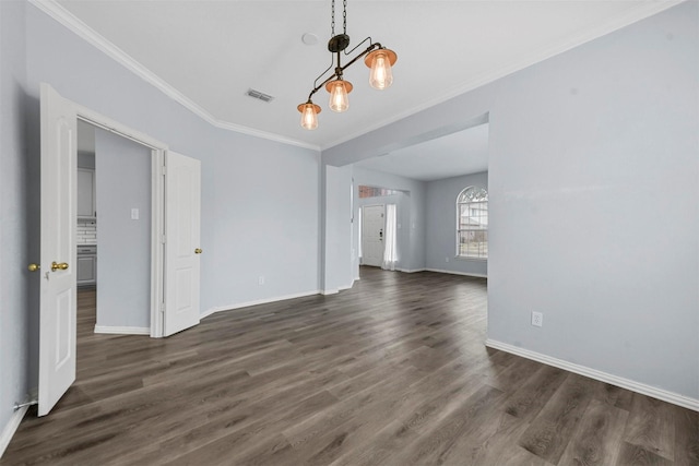 unfurnished dining area with dark hardwood / wood-style flooring and ornamental molding