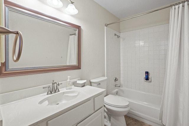 full bathroom with vanity, toilet, and shower / bath combo with shower curtain