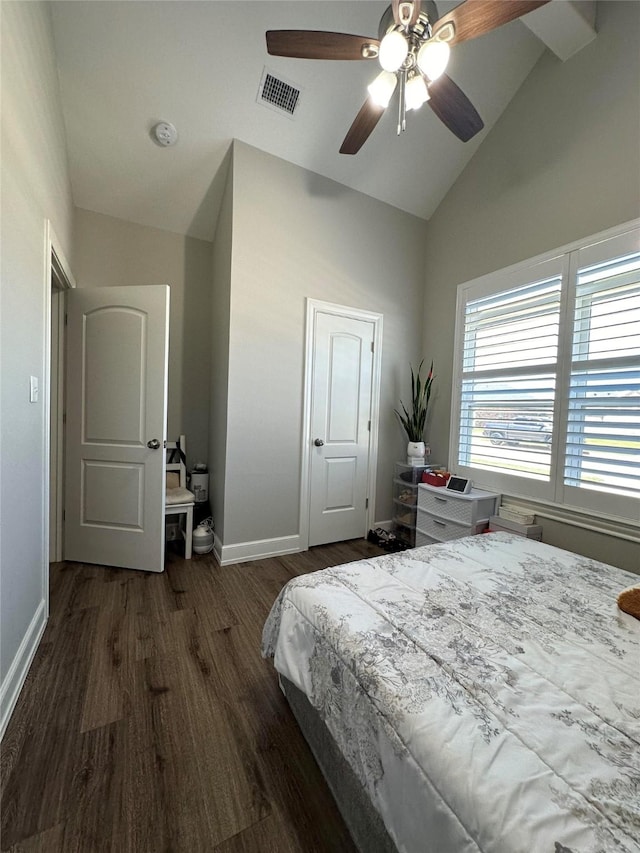 bedroom with high vaulted ceiling, dark hardwood / wood-style floors, and ceiling fan