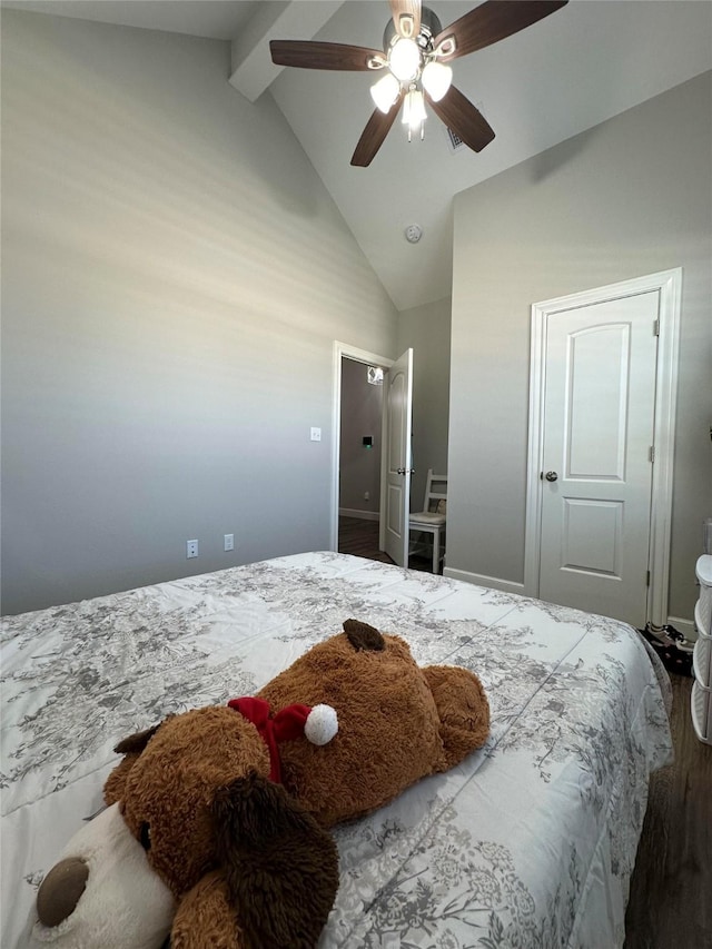 bedroom with ceiling fan, beam ceiling, and high vaulted ceiling