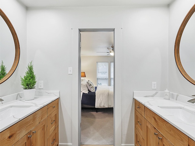 bathroom with ceiling fan and vanity