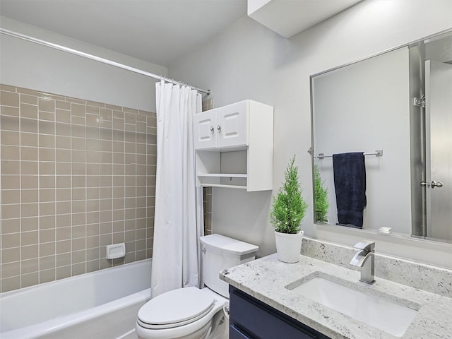 full bathroom with shower / tub combo with curtain, vanity, and toilet