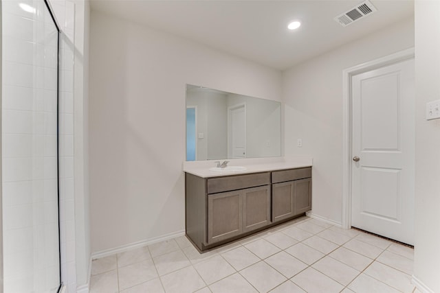 bathroom with vanity and tile patterned floors