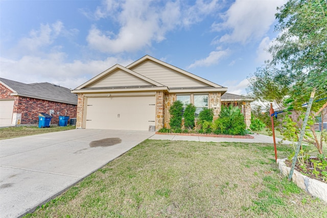 view of front of property with a garage and a front yard