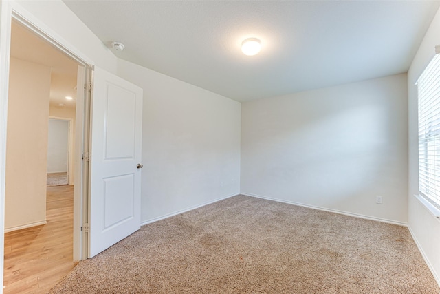 empty room with light carpet