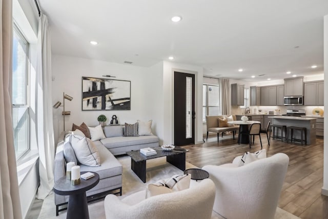 living room with light hardwood / wood-style floors