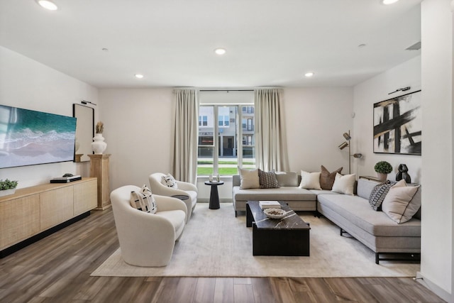 living area featuring recessed lighting and wood finished floors