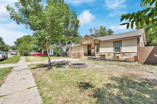 view of front of home featuring a fire pit