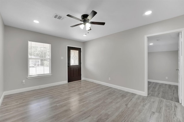 entryway featuring ceiling fan and light wood-type flooring